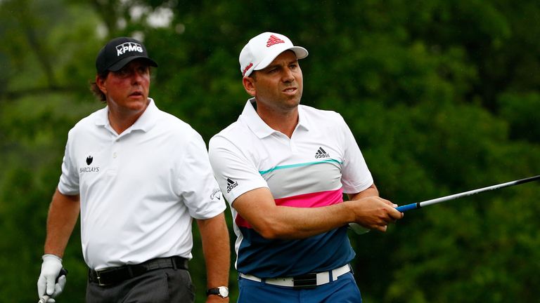 HUMBLE, TX - MARCH 31:  (L) Phil Mickelson of the United States and (R)  Sergio Garcia of Spain stand on the 15th tee during the first round of the Shell H