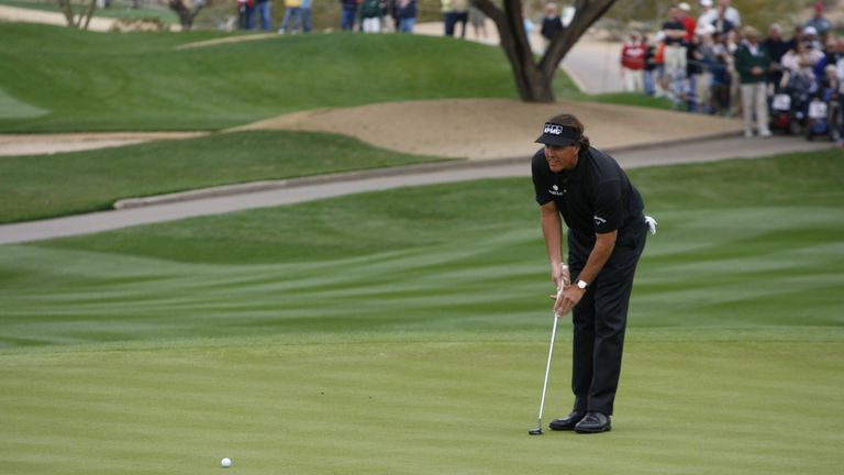 SCOTTSDALE, AZ - FEBRUARY 3: Phil Mickelson putts during the final round of the Waste Management Phoenix Open at TPC Scottsdale on February 3, 2013 in Scot
