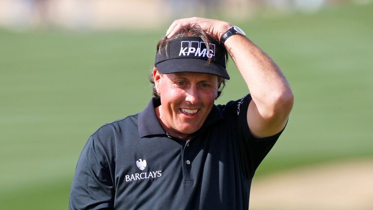 SCOTTSDALE, AZ - JANUARY 31: Phil Mickelson reacts after missing his birdie putt on the ninth hole that would have given him a round of 59 during the first