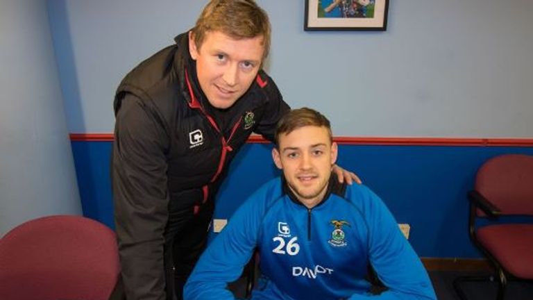 Defender, Louis Laing, puts pen to paper on a Inverness contract