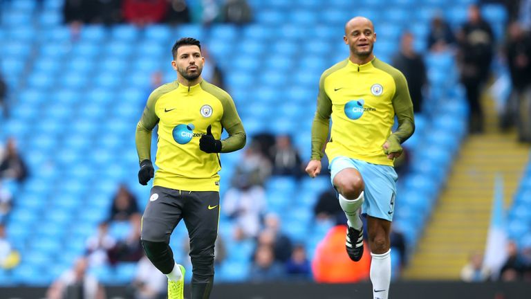 Sergio Aguero and Vincent Kompany of Manchester City warm up prior to the Premier League match v Swansea
