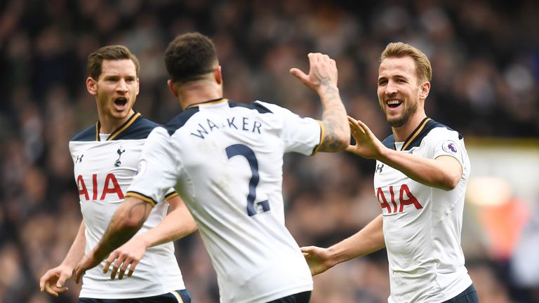 Harry Kane celebrates his hat-trick with team-mate Kyle Walker