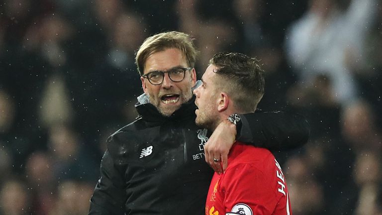 Liverpool manager Jurgen Klopp embraces Jordan Henderson after the Premier League match v Chelsea at Anfield, Liverpool
