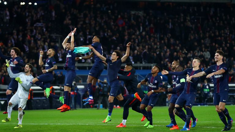 PARIS, FRANCE - FEBRUARY 14:  Paris Saint-Germain players celebrate victory after the UEFA Champions League Round of 16 first leg match between Paris Saint