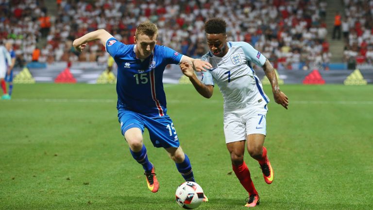 NICE, FRANCE - JUNE 27:  Raheem Sterling of England and Jon Dadi Bodvarsson of Iceland compete for the ball during the UEFA EURO 2016 round of 16 match bet
