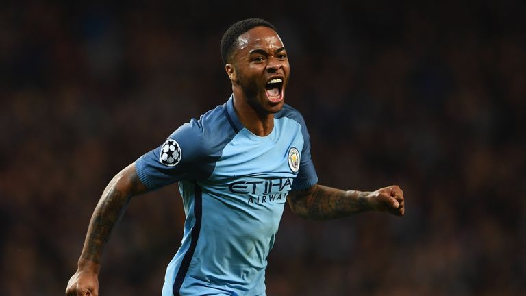 Raheem Sterling of Manchester City celebrates as he scores their first goal 
