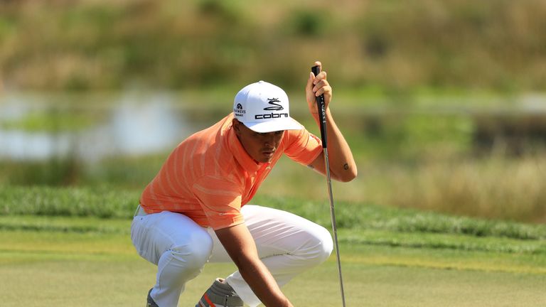 PALM BEACH GARDENS, FL - FEBRUARY 26:  Rickie Fowler of the United States lines up a putt on the second green during the final round of The Honda Classic a