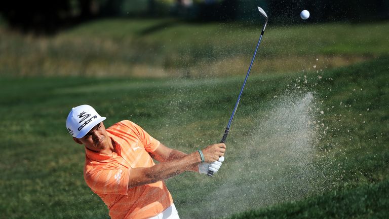 PALM BEACH GARDENS, FL - FEBRUARY 26:  Rickie Fowler of the United States plays a shot from a bunker on the seventh hole during the final round of The Hond