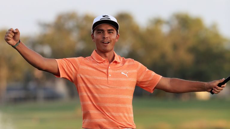 PALM BEACH GARDENS, FL - FEBRUARY 26:  Rickie Fowler of the United States celebrates winning on the 18th green during the final round of The Honda Classic 