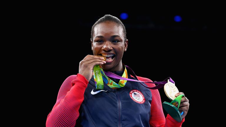 RIO DE JANEIRO, BRAZIL - AUGUST 21:  Gold medalist Claressa Maria Shields of the United States poses on the podium during the medal ceremony for the Women'