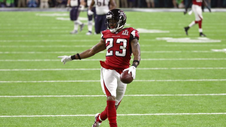HOUSTON, TX - FEBRUARY 05:  Robert Alford #23 of the Atlanta Falcons scores an 82 yard touchdown after an interception against the New England Patriots dur