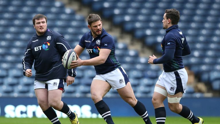 Ross Ford runs with the ball during the Scotland captain's run at Murrayfield Stadium on February 5, 2016 in Edinburgh