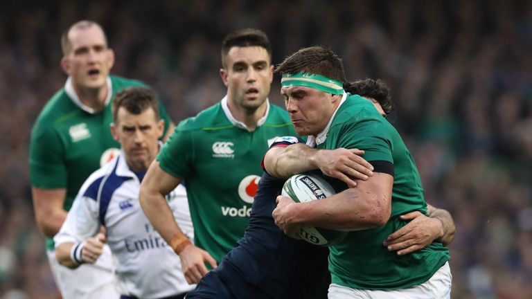 CJ Stander is tackled by France's Kevin Gourdon