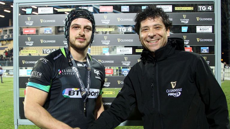 Dan Evans is presented with the man of the match award after his hat-trick against Zebre