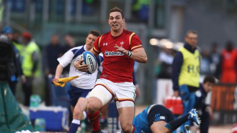 George North evades the attempted tackle from Italy's Leonardo Ghiraldini to score Wales' third try