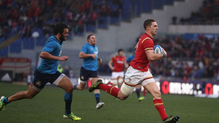 Wales wing George North outpaces Luke McLean to score his team's third try