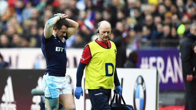 Greig Laidlaw leaves the pitch injured against France