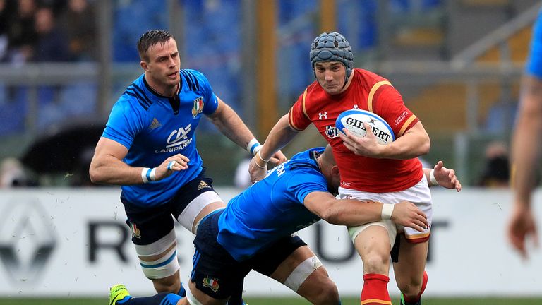 Jonathan Davies (right) is tackled by Italy's Sergio Parisse