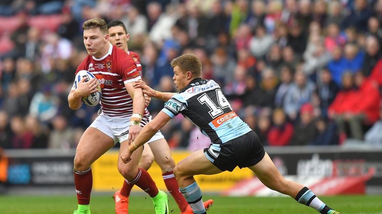 George Williams takes on Cronulla's Jayden Brailey