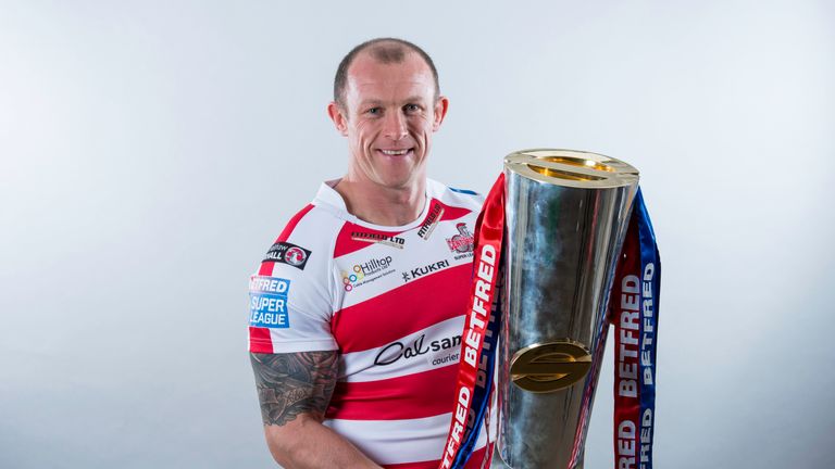 Leigh's Micky Higham with the Super League trophy