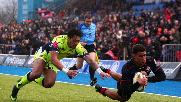 Nathan Earle beats Denny Solomona goes over to score against Sale