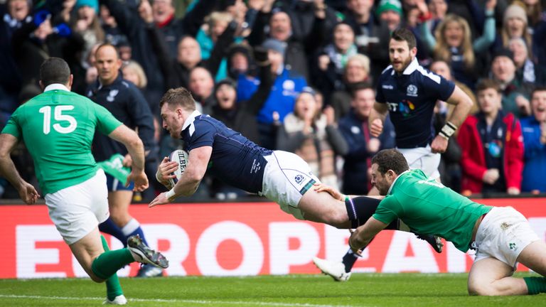 Stuart Hogg scores his first try against Ireland