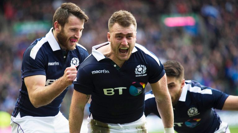 Stuart Hogg celebrates after scoring his first try against Ireland