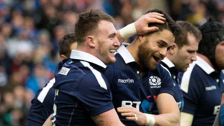 Stuart Hogg (left) celebrates his second try against Ireland with team-mate Sean Maitland