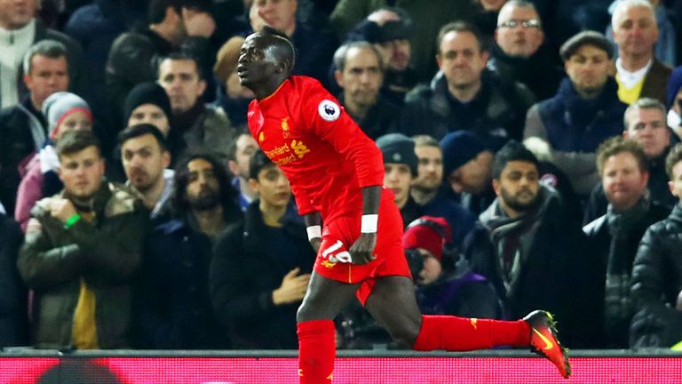 Sadio Mane celebrates Liverpool's opening goal against Tottenham