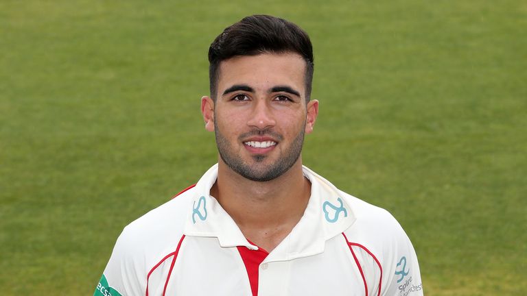 MANCHESTER, ENGLAND - APRIL 08:  Saqib Mahmood poses during Lancashire CCC  photocall at Old Trafford on April 8, 2016 in Manchester, England.  (Photo by J