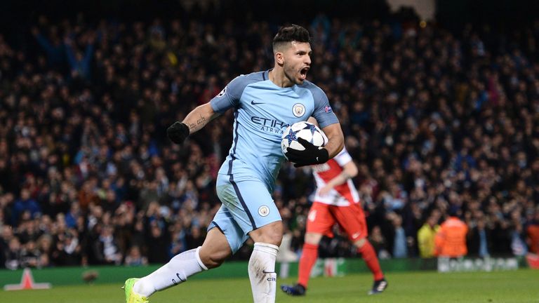 Manchester City's Argentinian striker Sergio Aguero celebrates scoring their second goal during the UEFA Champions League Round of 16 first-leg football ma