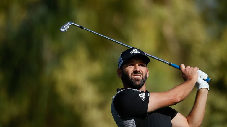 DUBAI, UNITED ARAB EMIRATES - FEBRUARY 04:  Sergio Garcia of Spain plays his second shot on the 17th hole during the completion of the weather delayed seco