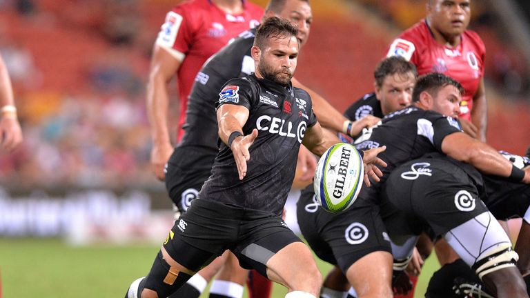 BRISBANE, AUSTRALIA - FEBRUARY 24:  Sharks player Jacobus Reinach kicks the ball during the round one Super Rugby match between the Reds and the Sharks at 