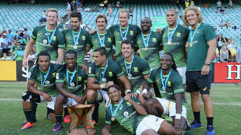 SYDNEY, AUSTRALIA - FEBRUARY 05:  South Africa pose with medals at the conclusion of the Cup Final match between England and South Africa in the 2017 HSBC 