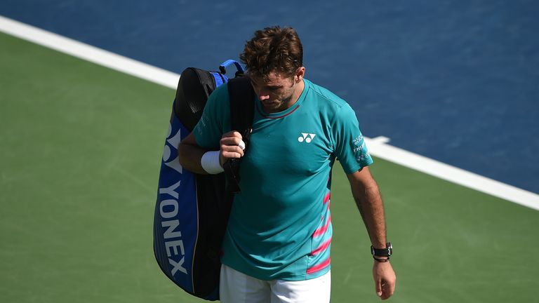 DUBAI, UNITED ARAB EMIRATES - FEBRUARY 28:  Stan Wawrinka of Switzerland looks dejected after loosing to Damir Dzumhur of Bosnia and Herzegovina on day thr