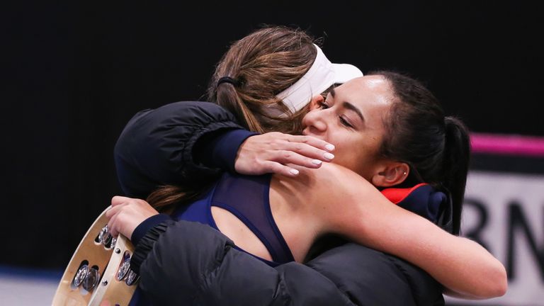 Heather Watson of Great Britain congratulates Johanna Konta as she celebrates after the Fed Cup Europe/Africa Group 1