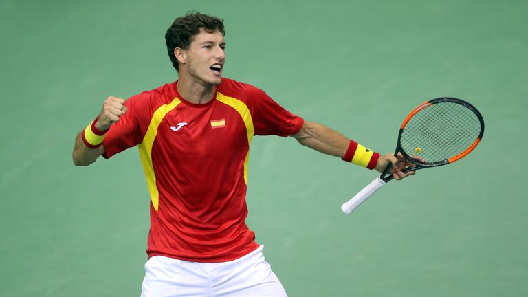 Spain's Pablo Carreno Busta celebrates after winning his singles match against Croatia's Nikola Mektic during the first-round Davis Cup tennis match