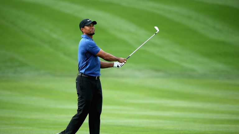 DUBAI, UNITED ARAB EMIRATES - FEBRUARY 02:  Tiger Woods of the USA in action during the first round of the Omega Dubai Desert Classic on the Majlis Course 