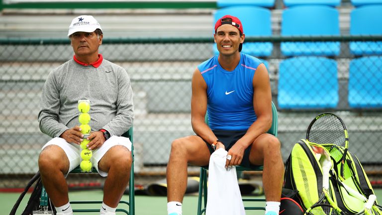 Toni Nadal and Rafael Nadal of Spain chat during a practice session ahead of the Rio 2016 Olympic Games