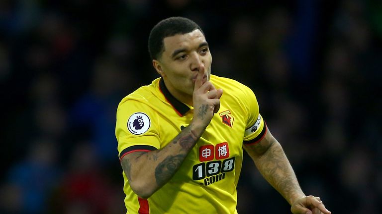 Troy Deeney celebrates after opening the scoring from the penalty spot