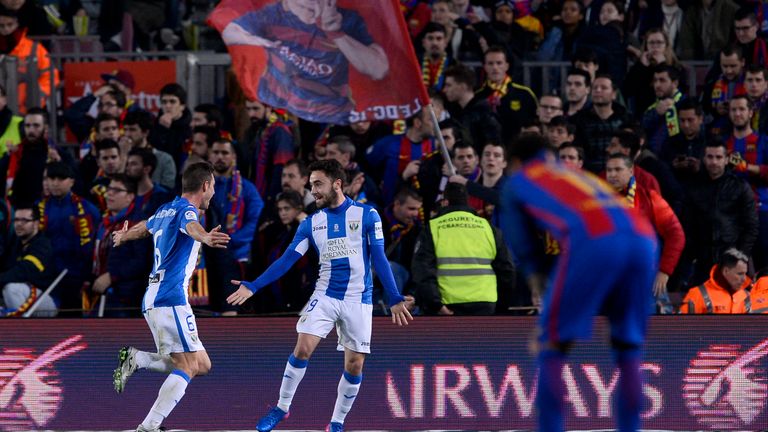 Leganes' midfielder Unai Lopez (R) celebrates his goal with Leganes' defender Alberto Martin during the Spanish league football match FC Barcelona vs CD Le