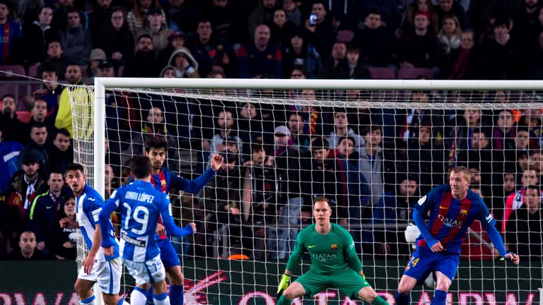 BARCELONA, SPAIN - FEBRUARY 19:  Unai Lopez of CD Leganes shoots on goal and scores his team's first goal during the La Liga match between FC Barcelona and