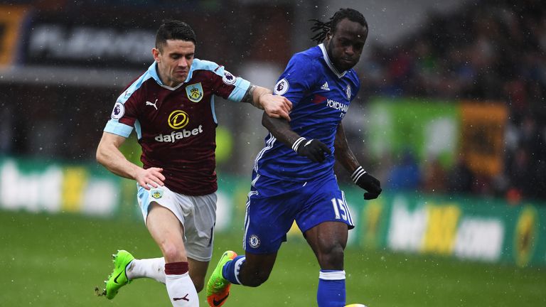 Robbie Brady of Burnley and Victor Moses of Chelsea in action during the Premier League match at Turf Moor