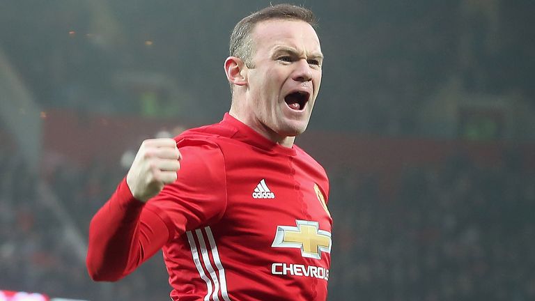 Wayne Rooney celebrates after scoring and equalling Sir Bobby Charlton's club goals record of 249 during the Emirates FA Cup Third Round against Reading 