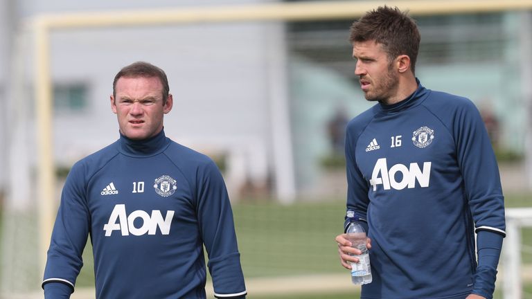 MANCHESTER, ENGLAND - AUGUST 05:  Wayne Rooney and Michael Carrick of Manchester United in action during a first team training session at Aon Training Comp