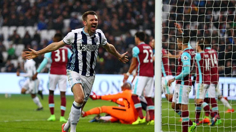 STRATFORD, ENGLAND - FEBRUARY 11: Gareth McAuley of West Bromwich Albion celebrates scoring their second goal to make it 2-2 during the Premier League matc