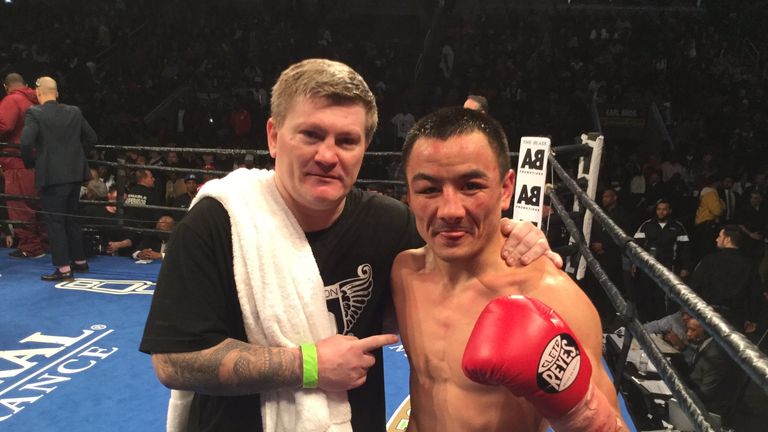 Zhanat Zhakiyanov celebrates with trainer Ricky Hatton after winning the WBA bantamweight title. Picture from @HitmanHatton