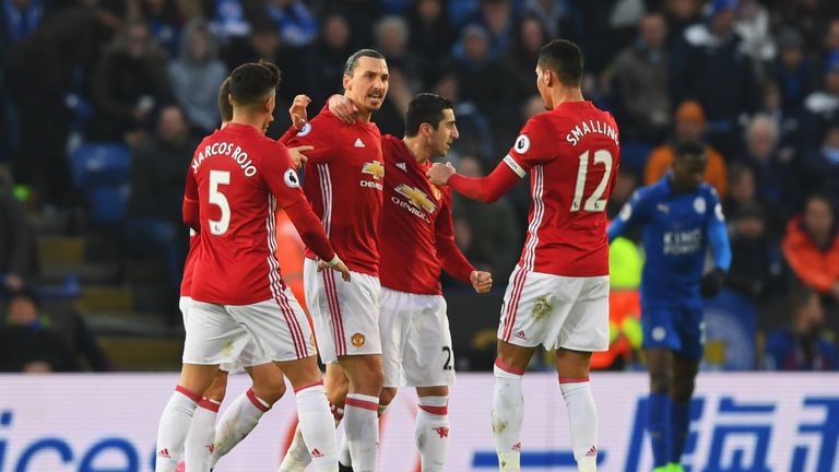 Zlatan Ibrahimovic of Manchester United (C) celebrates with team-mates as he scores their second goal during the Premier League match at Leicester City