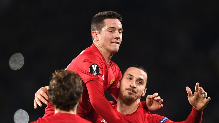 MANCHESTER, ENGLAND - FEBRUARY 16:  Zlatan Ibrahimovic of Manchester United celebrates scoring his sides first goal with Ander Herrera  during the UEFA Eur