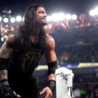Roman Reigns celebrates his crunch win at Fastlane